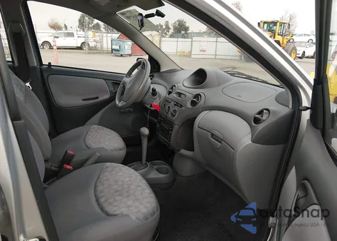 2000 Toyota Echo z USA, uszkodzony, nr VIN JTDBT1239Y5020095